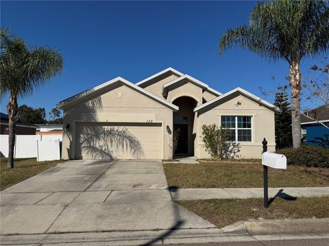 Photo of 132 Highland Meadows Avenue, Davenport, FL 33837 (MLS # O6360952)