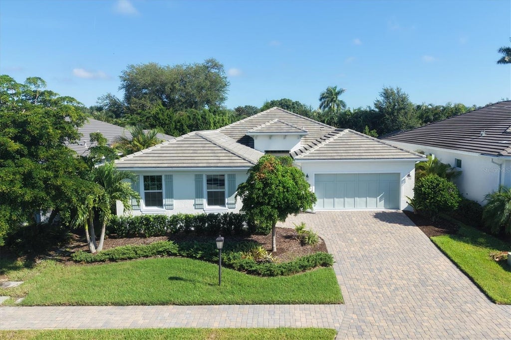 Photo of 7717 Sandhill Lake Drive, Sarasota, FL 34241 (MLS # A4705683)