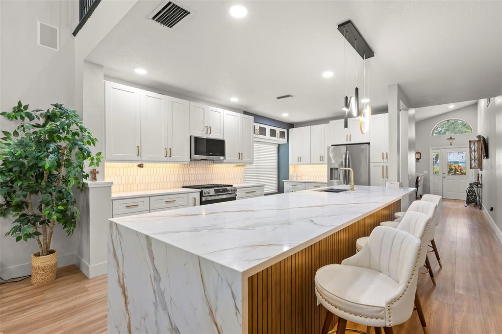 Photo of 9915 Hartwell Bridge Circle, Tampa, FL 33626 (MLS # TB8519138)