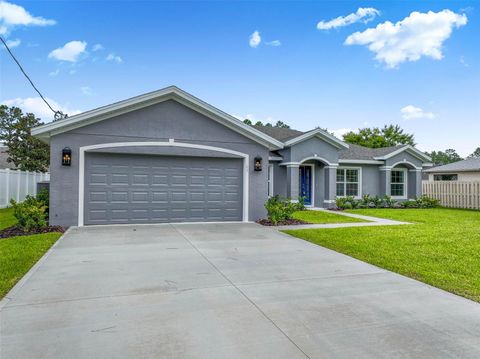 Photo of 11 Riverdale Lane, Palm Coast, FL 32164 (MLS # FC310163)