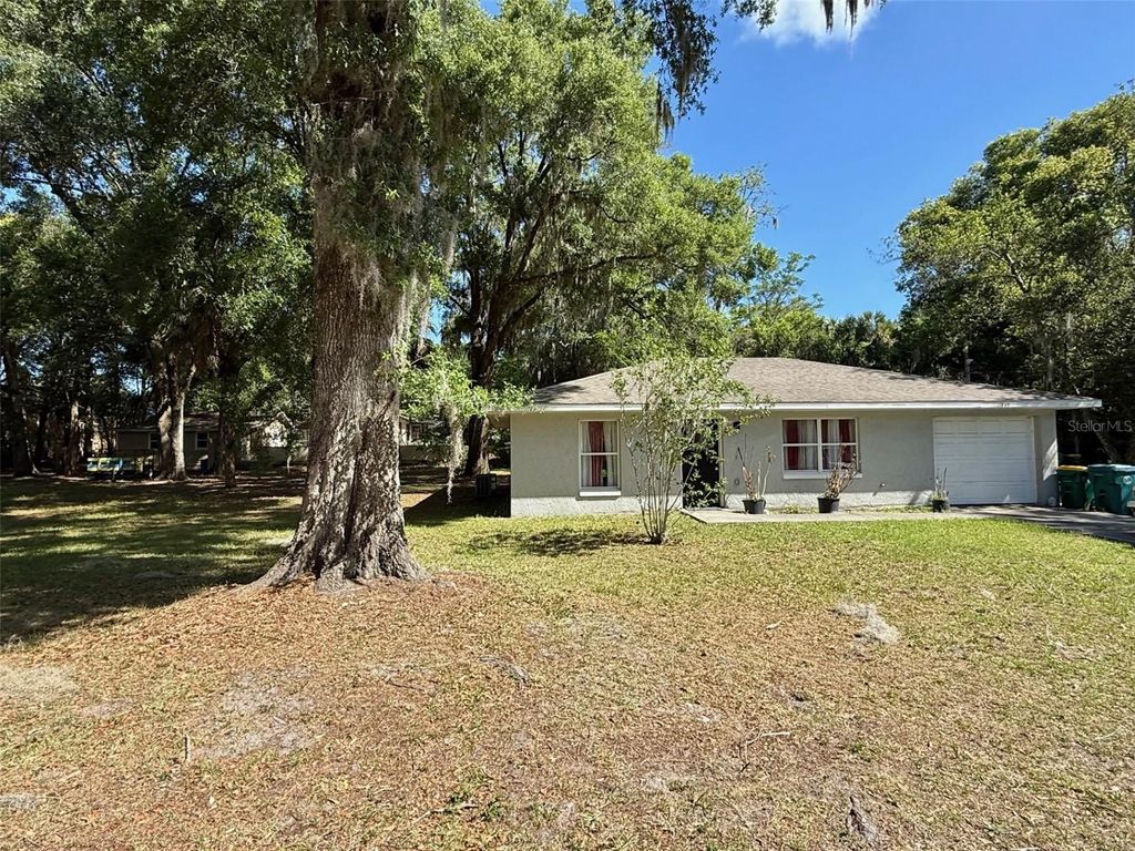 Photo of 719 E Georgia Avenue, Deland, FL 32724 (MLS # V4948553)