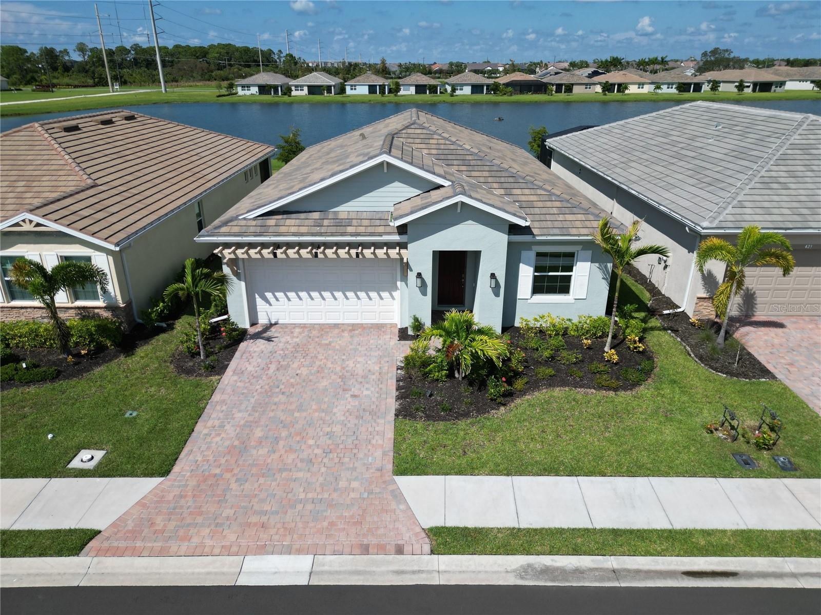 419 Ibiza Loop, Venice, FL 34292
Available October 1, 2025 | 12-Month Lease | $2,800/month | $2,800 Deposit.
Serene Lake Views & Resort-Style Living-Community pool, Fitness center, Bocce ball and walking trails, and more in Palencia.
Stunning 2023-Built Home in Gated Palencia – North Venice
2 Bedrooms + Den | 2 Baths | 1,670 Sq Ft | Tandem 2-Car Garage
Step into modern Florida living in this nearly new single-family home beautifully landscaped and located in the sought-after gated community of Palencia. Designed for comfort, style, and convenience, this home is perfect for tenants seeking a long-term rental with resort-style amenities in a prime location.
Highlights you will love:
Bright open floor plan with high ceilings/doors & split bedrooms.
Gourmet kitchen with quartz countertops, soft-close cabinetry, pull out drawers and trash, and roll-out organization.
Hurricane impact windows & doors for peace of mind.
Screened lanai with serene lake and fountain views.
Plantation shutters & ceiling fans in every room.
Tile floors in main living, plush carpet in bedrooms.
Laundry room with washer & dryer and tall laundry cabinets included.
Spacious tandem 2-car garage
Community Amenities:
Secure gated entry,
Resort-style pool & fitness center,
Clubhouse & bocce ball,
Walking trails & guest parking,
Lawn care included.
Location Benefits:
15 minutes to Nokomis & Venice Beaches,
Easy access to I-75 for commuting,
A-rated Sarasota County schools,
Close to Sarasota Memorial Hospital – Venice Campus,
Shopping, dining, and recreation nearby,
Available October 1st for annual lease – $2,800/month.
Contact today to schedule a private showing – homes in Palencia rent quickly!
Agent-Owned