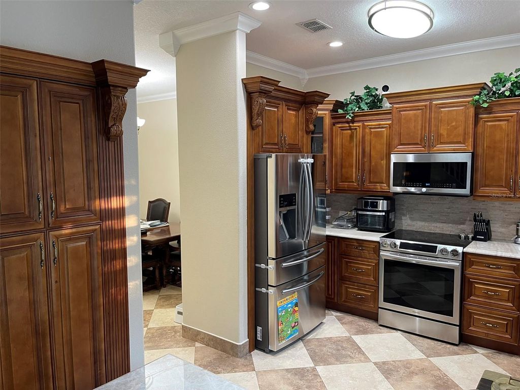 Photo of 6941 Belt Link Loop, Wesley Chapel, FL 33545 (MLS # TB8461307)