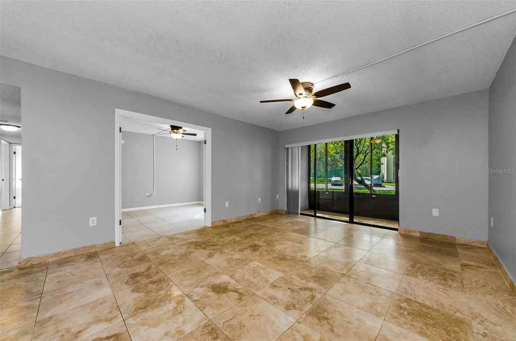 Photo of 3211 Lake Pine Way E #H1, Tarpon Springs, FL 34688 (MLS # TB8432052)