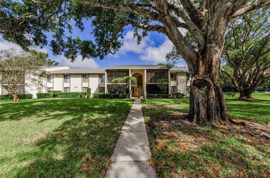 One or more photo(s) has been virtually staged. Welcome to Pine Ridge at Lake Tarpon Village II, nestled in the highly sought-after East Lake area! This spacious 3-bedroom, 2-bath condo blends comfort, convenience, and a welcoming community lifestyle. Inside, you’ll love the thoughtful updates, including new ceiling fans in every room, new carpet in the primary bedroom, and a programmable thermostat for year-round comfort. The kitchen is equipped with a reverse osmosis water filtration system, soft-close kitchen cabinets, coffered ceiling, and a full suite of appliances—all purchased in January 2023—including refrigerator, range, microwave, dishwasher, washer, and dryer. Both updated bathrooms feature new WaterSense toilets for added efficiency.
Outside your door, enjoy a beautifully maintained community filled with amenities: a heated pool and hot tub, tennis courts, clubhouse, and a scenic walking path around the lake. Even better, this is a vibrant, active neighborhood that hosts regular holiday cookouts and game nights, making it easy to connect with neighbors and enjoy a social lifestyle. The monthly condo fee covers exterior and grounds maintenance, water, sewer, trash, and all recreational facilities—providing a truly worry-free way of living. Enjoy an assigned parking space and a fantastic location ~ just minutes to the Pinellas Trail, YMCA, highly-sought-after schools, shopping, dining, and only a 25-minute drive to Tampa International Airport and the world-renowned Gulf beaches.. Whether you’re downsizing, relocating, or seeking a low-maintenance lifestyle, this condo has it all. Move-in ready and waiting for you!