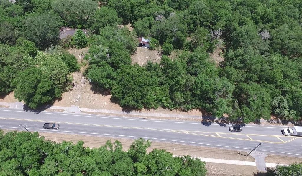Photo of 451 Rolling Acres Road, Lady Lake, FL 32159 (MLS # G5111803)