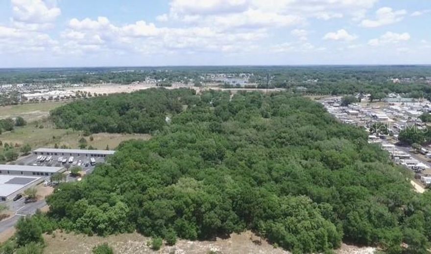 19.39 Zoned CP, Planned Commercial on Rolling Acres Rd in Lady Lake city limits. The property has 660 feet of paved road frontage on Rolling Acres Rd and 1,280 feet on Oak St. FDOT Average Trips per day on Rolling Acres is 15,300. The property’s uses include multi-tenant commercial buildings, retail centers, service-related businesses, restaurants, mixed-use developments, multi-family housing, retail, medical offices, and professional offices. The property is located in a corridor to The Villages, one of the largest retirement communities in Florida. The Villages spans over 80 square miles, equivalent to more than 51,200 acres. Remarkably, The Villages continues to grow and ranks among the fastest-growing cities in Florida. The Villages community encompasses multiple zip codes and is situated in three distinct county jurisdictions: Lake County, Sumter County, and Marion County.
