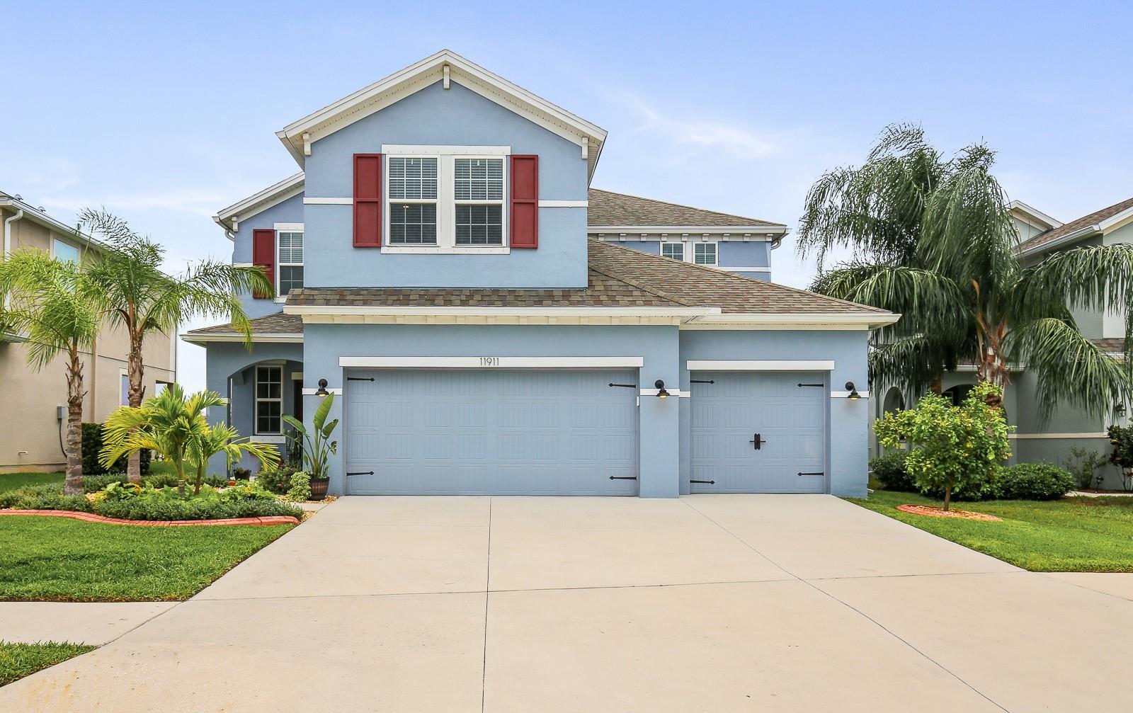 One or more photo(s) has been virtually staged. This stunning 5-bedroom, 3-bathroom, 2,912 sq ft home is perfectly situated on an oversized, fenced lot with a captivating pond view. Tucked away in a private cul de sac, this property features meticulous landscaping, elegant palm trees, and fresh exterior paint. Upon entry, you'll be immediately charmed by the formal dining room's tray ceiling, adorned with a chic light fixture. The home offers wood-look tile flooring throughout the main living areas and bathrooms, while the bedrooms are carpeted for added comfort. The open concept living room at the back of the house is a perfect space for entertaining, complete with a ceiling fan and prewiring for a home entertainment system. This area seamlessly connects to a gourmet kitchen equipped with stainless steel appliances, including double built-in ovens and a spacious cooktop. Granite countertops, and a stylish tile backsplash. The large island/breakfast bar, featuring a farmhouse sink, is ideal for serving meals, and a spacious walk-in pantry provides ample storage. The dinette area, which overlooks the outdoor patio through plantation shutters on the sliding glass door, is perfect for casual dining. A guest suite on the main floor, complete with its own full bathroom featuring granite countertops and a shower/tub combo, ensures comfort and privacy for guests. Upstairs, an oversized bonus room awaits, prewired for a home theater system. The primary suite serves as a private retreat with natural light streaming in through two large windows that offer picturesque views of the backyard and pond. The primary bathroom boasts a dual vanity with ample granite counter space,
wrap-around mirrors, a walk-in shower with a glass door, a separate soaking tub, and a private water closet. An expansive walk in closet completes the primary suite. The additional three spacious bedrooms, including one with a walk-in closet, share a bathroom featuring a dual vanity, granite countertops, and a shower/tub combo. The backyard features a covered patio, and the fully fenced yard offers privacy and security while providing stunning views of the pond. Additional features include a water softener and a kitchen reverse osmosis system. Community amenities such as a pool, playgrounds, and a dog park further enhance the appeal of this home. Conveniently located just a short drive away from shopping, dining, nature parks, hospitals, and the entrances to I-75 and US 301, this home truly has everything you need. Complete lawn maintenance, including mowing, shrub pruning, irrigation system service, turf, and plant fertilization and plant pest control are included in rent services saving you time and money! NOTE: Additional $59/mo. Resident Benefits Package is required and includes a host of time and money-saving perks, including monthly air filter delivery, concierge utility setup, on-time rent rewards, $1M identity fraud protection, credit building, online maintenance and rent payment portal, one lockout service, and one late-rent pass. Renters Liability Insurance Required. Call to learn more about our Resident Benefits Package.