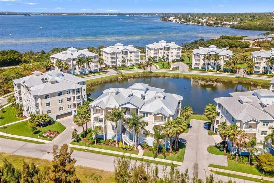 Welcome to paradise at The Preserve at Palma Sola Bay Club, where coastal elegance meets effortless resort-style living. Built in 2021, this stunning penthouse condo offers the perfect blend of modern construction and timeless Key West charm—just minutes from the world-famous beaches of Anna Maria Island.
This spacious 3-bedroom, 2.5 bath residence features an open-concept design filled with natural light, enhanced by abundant windows and multiple private patios. Enjoy serene lake views with a tranquil fountain, along with glimpses of Palma Sola Bay—creating the perfect backdrop for breathtaking Florida sunsets. The versatile third bedroom can easily function as a den or home office, adding flexibility to your lifestyle.
The beautifully appointed kitchen boasts wood cabinetry, light granite countertops, under-cabinet lighting, and ample storage—ideal for both everyday living and entertaining. Tile flooring runs throughout (no carpet), and a large interior laundry room provides additional storage and convenience. This home is partially furnished and move-in ready.
Built for peace of mind, the property includes hurricane impact windows and durable metal roofing. Two covered parking spaces add extra value and convenience.
Step outside and immerse yourself in a true tropical oasis, surrounded by lush landscaping, swaying palm trees, and meticulously maintained grounds.  Elevator access along with private stairs to access the 3rd floor.  

The community is rich with amenities, including a stunning clubhouse, heated resort-style pool with multiple lounging areas, outdoor bar and kitchen, fitness center, billiards room, putting greens, grilling stations, and a vibrant social calendar filled with community events.
Pet lovers will appreciate the extremely dog-friendly atmosphere, complete with its own dedicated dog park.
Whether you're searching for a full-time residence, vacation getaway, or investment opportunity, this exceptional penthouse offers the ultimate Florida lifestyle—just moments from the beach, yet tucked away in a peaceful bayfront setting.
Experience island living at its finest—your slice of paradise awaits.