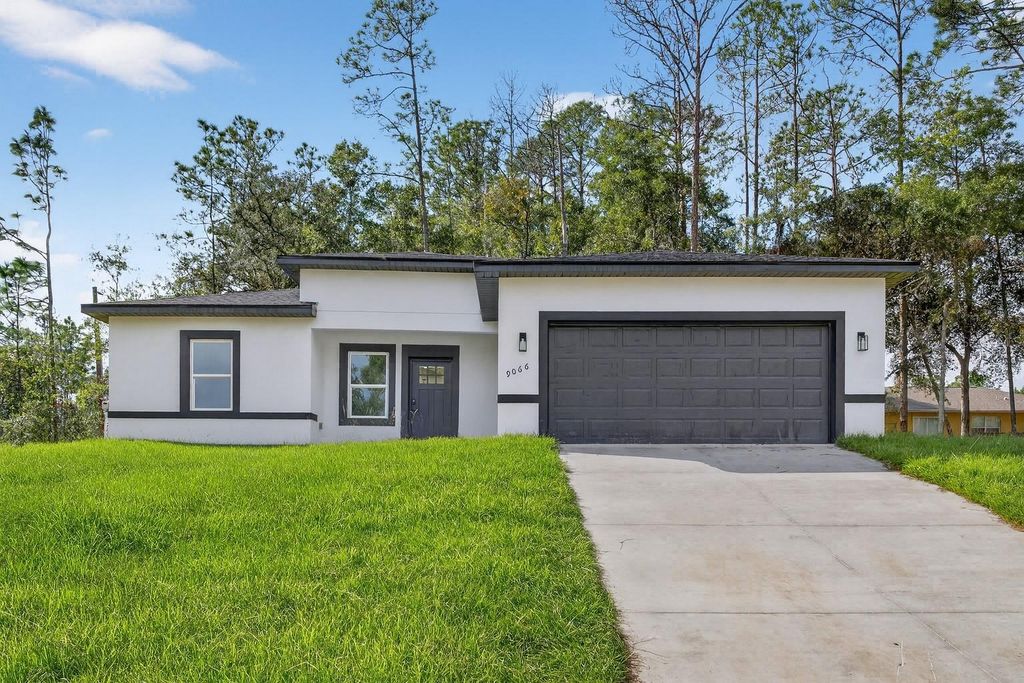 Photo of 9066 N Akola Way, Citrus Springs, FL 34434 (MLS # O6366009)