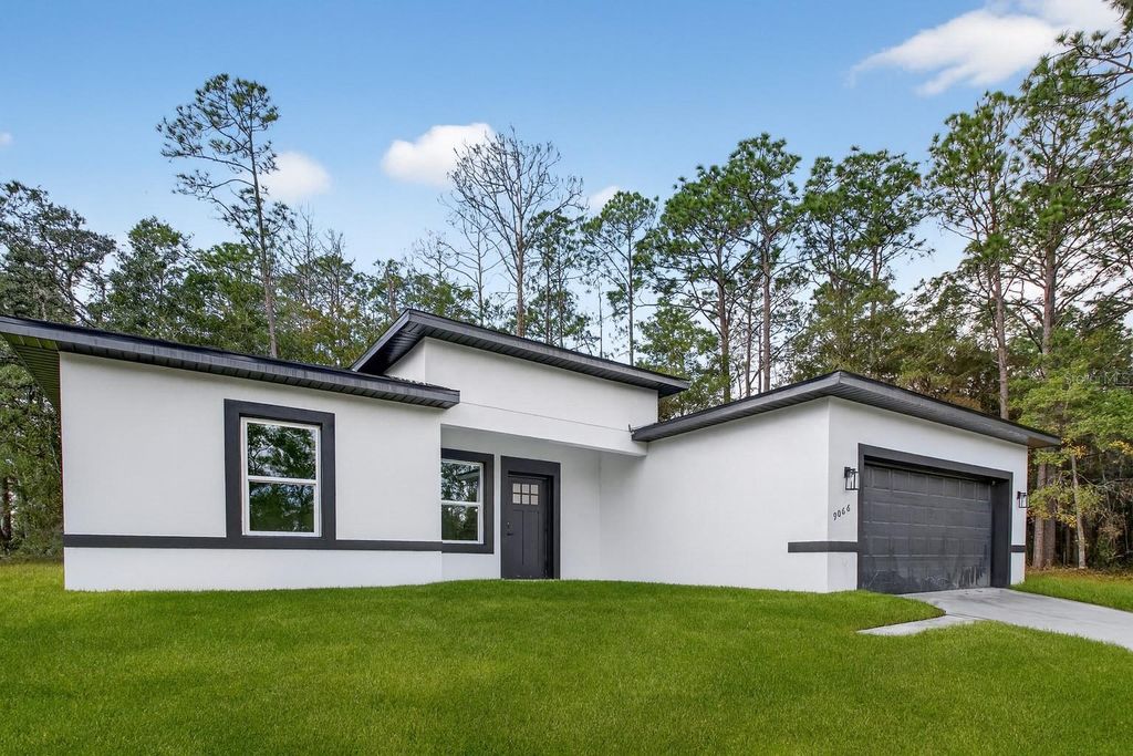 Photo of 9066 N Akola Way, Citrus Springs, FL 34434 (MLS # O6366009)