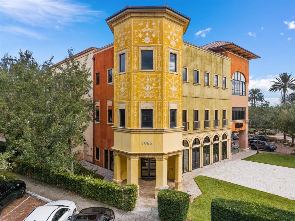 Photo of 7065 Westpointe Boulevard #317, Orlando, FL 32835 (MLS # O6440490)