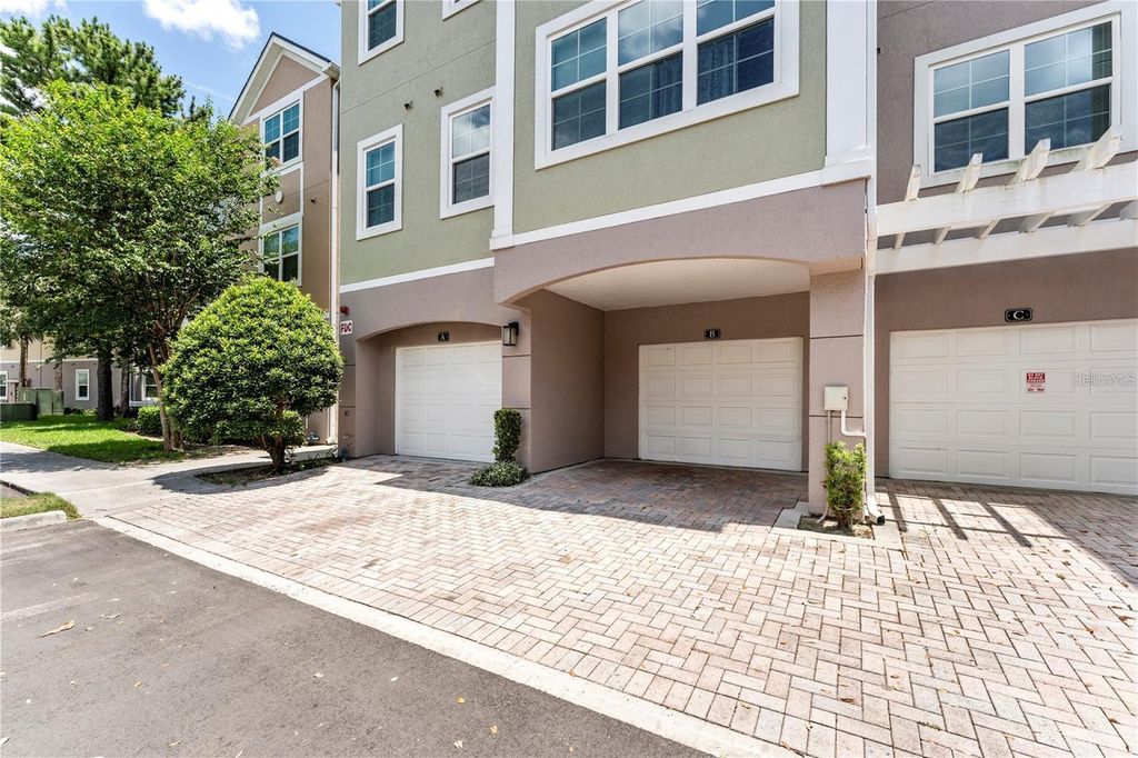 Photo of 3384 Corona Village Way #102, Orlando, FL 32835 (MLS # O6404186)