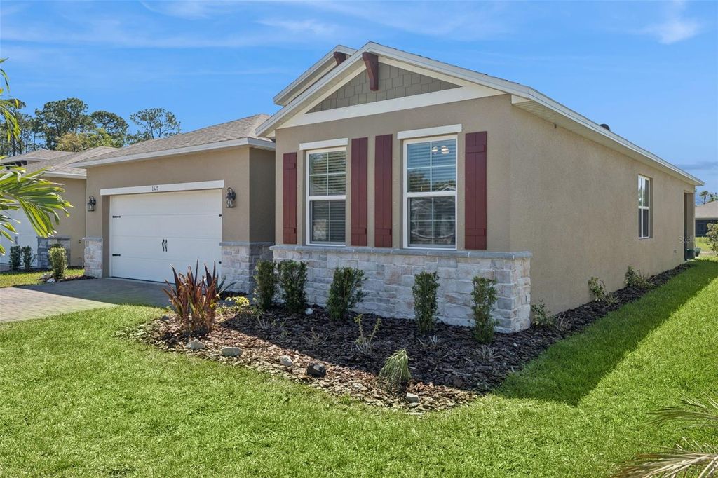 Photo of 1527 Delphi Way, New Smyrna Beach, FL 32168 (MLS # O6393041)