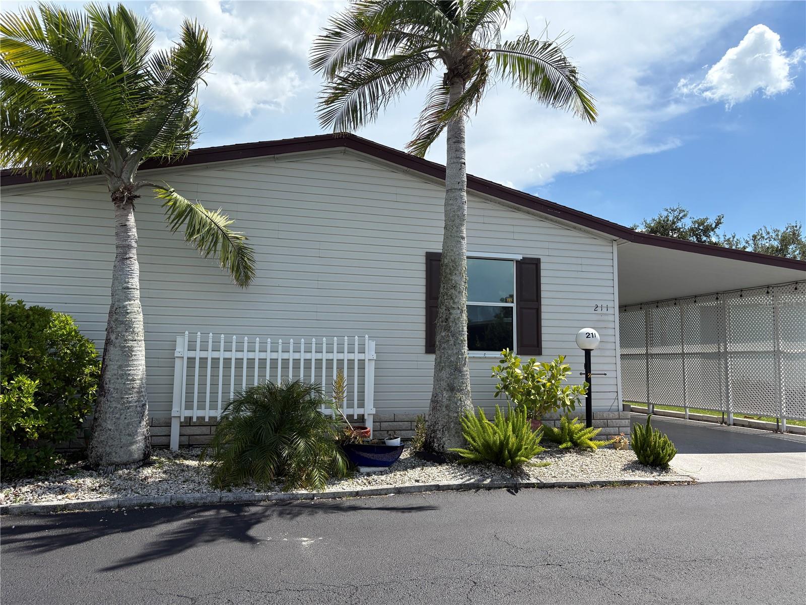 Best of the Best....There is Room to Roam in this beautifully turn-key furnished mobile home! 3 Bedrooms, 2 Bathrooms, Den, Inside Laundry.
Master Bedroom has full bath, and all 3 bedrooms have walk-in closets. Lots of windows throughout making all rooms light and bright. This home has up-dates all through...including kitchen with granite counters and a large pass through to living area. Bathrooms are updated with newer cabinets, lighting and a very large ensuite to master bedroom. There is a den as well as a very nice size laundry room. Gold Tree has lots of activity always listed in the monthly newsletter's Calander of events. They include, luncheons, potlucks, outings, clubs, holiday parties and much more. There is a clubhouse/kitchen, library, work-out room, community pool, shuffleboard, pickleball. It is gated and has a storage lot for your RV's, Boats, and Trailers. The park is conveniently located to shopping, banking, hospitals, eateries, UTC Mall, Benderson Park, Riverwalk and best of all our beautiful beaches always rated among the top beaches in the U.S. Association says 55+, rentals allowed and your pets are welcome!