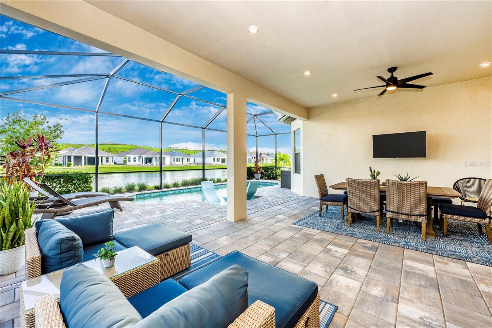 ? Live the Florida Resort Lifestyle – No CDD Fees & Luxury at Every Turn!
Welcome to your private Florida retreat—a fully upgraded, ranch-style pool home nestled in one of the region’s most sought-after gated Esplanade communities. With 3 bedrooms, 3 full baths, a dedicated home office, and top-tier finishes throughout, this home is designed for both upscale comfort and effortless entertaining.
Love to cook? This home features natural gas cooking both inside and out—a rare and highly desired feature in Florida! The gourmet kitchen boasts a premium gas cooktop that will impress any chef, while the outdoor kitchen with a built-in gas grill makes poolside meals and weekend gatherings a breeze.
Step outside to your extended screened lanai and sparkling pool overlooking a tranquil, man-made waterway. It’s the perfect backdrop for entertaining guests or unwinding with a drink at sunset.
Inside, enjoy an open-concept layout filled with natural light, elevated ceilings, and premium builder upgrades throughout—truly move-in ready.
Golfers will appreciate being just minutes from several world-renowned golf courses, including The Concession Golf Club, Waterlefe Golf & River Club, River Strand, IMG Academy Golf Club, and more.
You’ll also love being close to University Town Center (UTC Mall) – Premier shopping and award-winning dining, Downtown Sarasota & Downtown Bradenton, St. Armands Circle, Bradenton Beach & Siesta Key Beach; all within a 16-mile radius for the ultimate in convenience and lifestyle.
Community Features Include: Gated entry for added privacy & security, Resort-style pool & spa, Beautiful clubhouse & social gathering spaces, Fully equipped fitness center, Tennis & pickleball courts, Scenic hiking trails directly behind the home.
Enjoy the bonus of shared amenities across other Esplanade communities, all with no CDD fees!
Whether you're searching for a full-time residence, second home, or investment property, this home checks every box for the Florida lifestyle you’ve been dreaming of.
