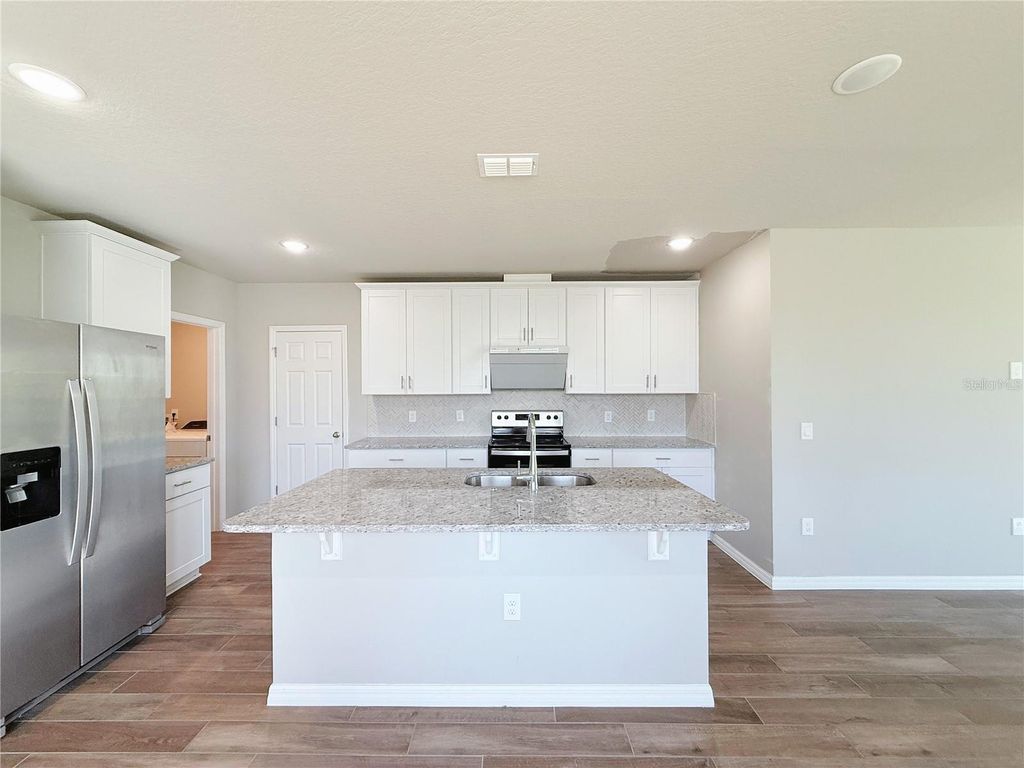 Photo of 17120 Cagan Crossings Boulevard, Clermont, FL 34714 (MLS # O6399332)