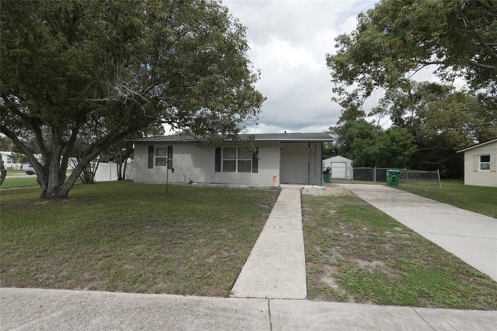 Photo of 580 Merrimac Street, Deltona, FL 32725 (MLS # O6444608)