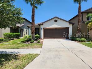 Lawn Care included! Nice small gated community right in the heart of Ruskin. This beautiful and immaculate 3/2 bath split plan home with bonus room/office has been freshly painted with luxury vinyl planking and oversized tile throughout. NO CARPET! The kitchen is a dream with wood cabinets, stainless appliances, granite throughout and a small island with bar and stools. There is a separate dining/breakfast area that overlooks a screened porch (pavers) with no backyard neighbors. Master suite is large with walk-in closet and separate bath. Master bath has two sinks, a large linen closet and an oversized walk-in shower. Saving the best for last...LAWN CARE (recycled sprinkling) IS INCLUDED AND ACCESS TO THE COMMUNITY POOL! Community amenities include pool, chairs, umbrellas, playground and soccer field. Location is amazing. Minutes to I-75. Easy drive to Bradenton, St. Petersburg, Apollo Beach, Tampa or Brandon.
