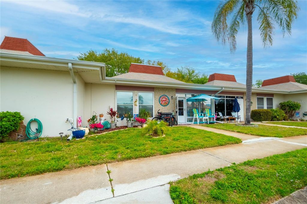 Photo of 4375 Tahitian Gardens Circle #B, Holiday, FL 34691 (MLS # TB8488422)