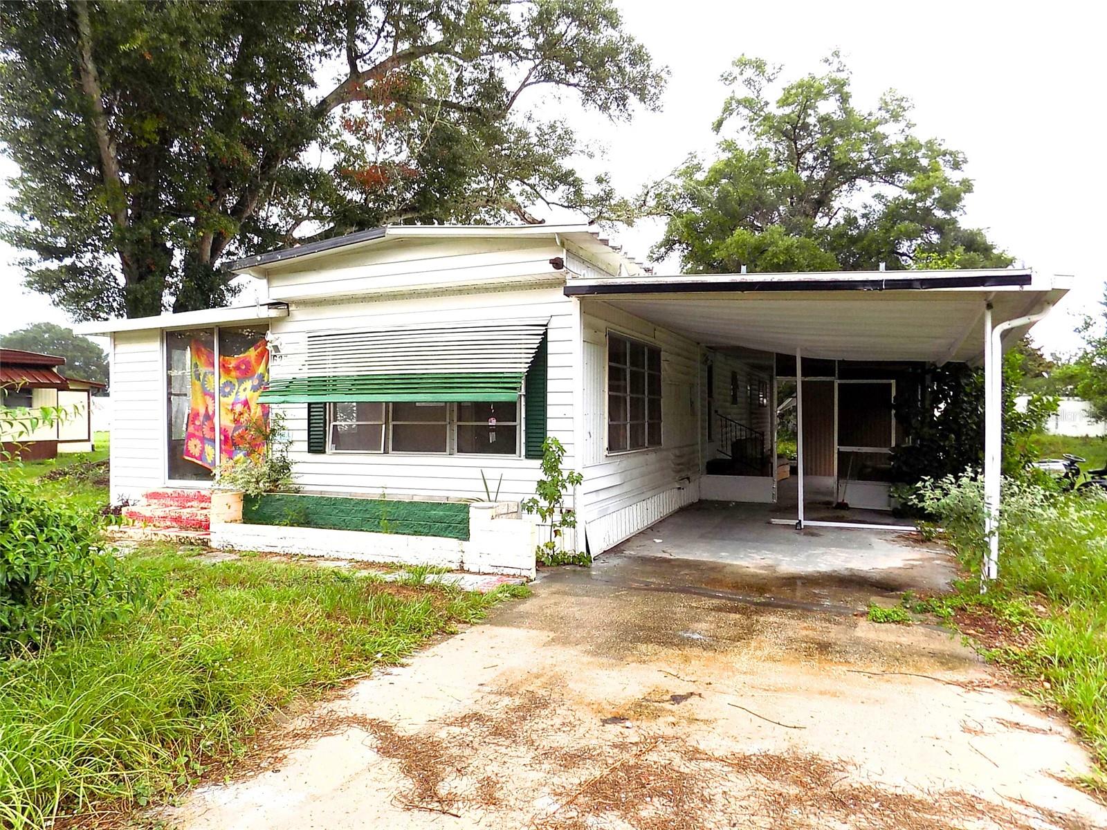 Prime Investment Opportunity in Ocala! Welcome to 6201 SW 57th Court, located in the established community of Bahia Oaks and within the Ocala city limits. This versatile property offers a 2-bedroom, 1-bath main home PLUS a separate 1-bedroom, 1-bath apartment, ideal for a seasonal home, investment property or a fix and flip opportunity. Sitting on a spacious 0.23-acre lot with no HOA, this property provides flexibility and freedom. This home is in need of renovation and may provide the perfect canvas for a primary resident or investor.The home is connected to public water and has a private septic system in place. Whether you’re an investor looking for rental potential or a homeowner ready to renovate and make it your own, this is an excellent opportunity. Conveniently located just minutes from I-75, major shopping centers, restaurants, and grocery stores — everything you need is within easy reach. Don’t miss your chance to own a property with endless potential in the heart of Ocala! All measurements and information is deemed reliable and shall be independently verified.
