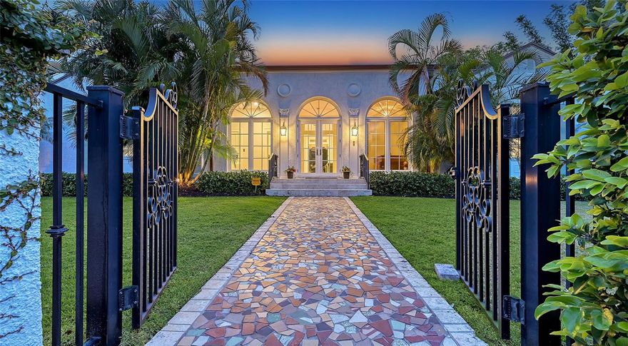 This stunning, newly renovated 4 bedroom, 4 and a half bath Mediterranean Revival estate, designed by Sarasota's renowned first architect, Alex Browning, seamlessly blends timeless elegance with modern luxury. Nestled on a lush, oversized lot of just under 20,000 square feet, this home offers privacy, tranquility, and exceptional craftsmanship. Boasting 10-foot ceilings and 9' French doors throughout, the home is bathed in natural light, highlighting the newly installed French oak hardwood floors. The chef’s kitchen is a dream, featuring exposed beams, a quartz center island, and a professional AGA Legacy 44” 6-burner gas range, perfect for preparing gourmet meals. Oversized Primary Bedroom leads into the newly renovated Primary Bath offering a spa-like experience, complete with a massive walk-in steam shower, a freestanding tub, and designer finishes. Each of the 3 Guest Bedrooms are spacious and ensuite, ensuring privacy and comfort for all.  The estate-sized completely fenced, lushly landscaped and private backyard area includes vintage fountains, a partially covered courtyard perfect for entertaining and an oversized pool. With updated electrical, PVC plumbing, and impact glass windows/doors, this home is as functional as it is beautiful. Located just steps away from shopping and dining in the desirable Southside Village and minutes away from vibrant downtown Sarasota, this home offers both convenience and sophistication in one of Sarasota’s most sought-after areas. 
Effective year built 2019 as found on Sarasota County Property Appraiser site