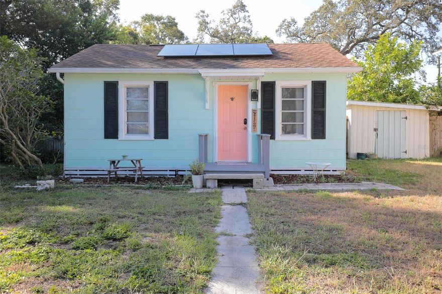 Great starter or retirement home --- security and peace of mind being High and Dry --- central location to the beach, St Pete, Clearwater and Tampa.   This 2 bed/1.5 bath/636 SF home boasts an updated bath and kitchen, stainless appliances and inside laundry.  Carpeted, king size primary bedroom with en suite and an ample walk in closet.  Back bedroom could also serve as an office or family room and has an attached half bath with laundry. Nice sized, fenced backyard with large shed for ample storage.  14 panel solar system to ease utility costs.  Would also be a perfect income producing rental opportunity for those looking to build their investment portfolio.  Major systems updated: Full electrical 2019, Roof 2019, Water Heater 2019, Solar 2022, 12,000 BTU wall unit a/c with heat 2025.  Two other 5,000 BTU wall units in each bedroom.