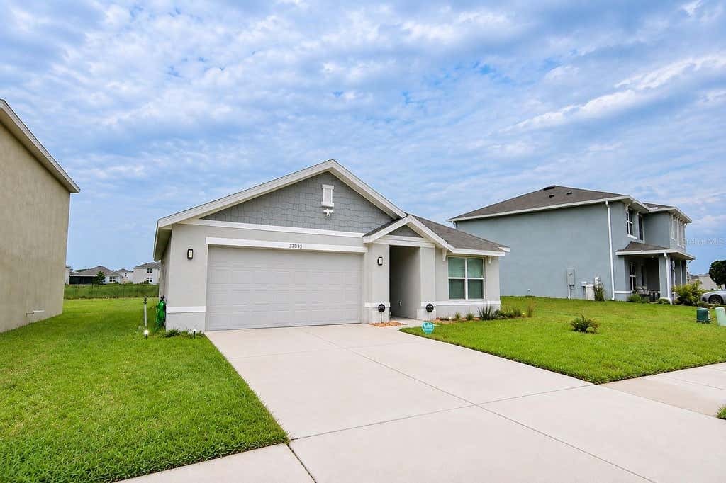 Photo of 37093 Sharks Eye Lane, Zephyrhills, FL 33541 (MLS # TB8539016)