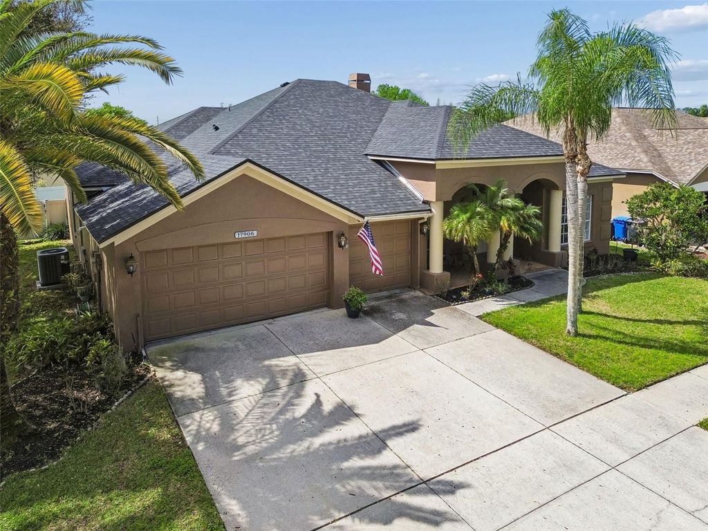 Photo of 17906 Sparrows Nest Drive, Lutz, FL 33558 (MLS # TB8487067)