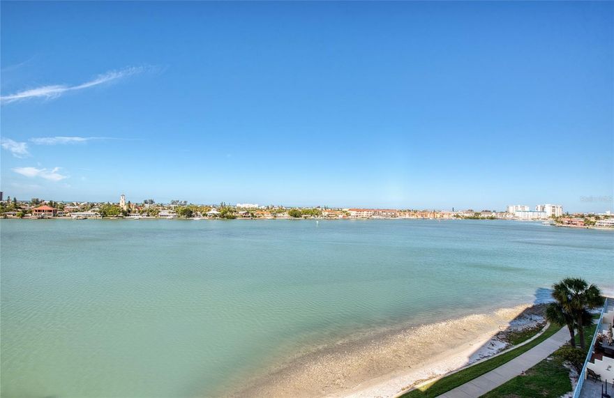 Beautiful sunset wide open views of the Intracoastal and Gulf from your private balcony in Harbourside Condo complex. This island complex is guard gated 24 hours and the community was developed by award winning JMC Communities. This unit has been completely remodeled. The Kitchen features wood cabinets, stainless steel appliances, beautiful granite countertops and a breakfast area overlooking Boca Ciega Bay. Other features include porcelain tile flooring, crown molding in Living and Dining Room areas. The primary bathroom has new vanity with granite counters. The guest bath has new shower tile and new vanity with granite. New interior doors throughout. Open floor plan with crown molding in the Living Room and Dining area. Hurricane impact windows and storm shutters on the balcony. Inside laundry. Fully furnished. Harbourside is a guard gated (24 hour) complex with many amenities including pool, his and hers fitness centers, shuffleboard, pickleball, tennis, hot tub, electric car charging stations, car wash stations, recently renovated clubhouse with many social events throughout the year, library, card room, billiards room, arts and crafts room, wood working area, yoga and water exercise classes. There is a 1.5 mile walkway around the complex along the waterfront which is lit up for nightly walks. Come see what resort living in Florida is all about. You can live your tropical, island dream here in Harbourside.