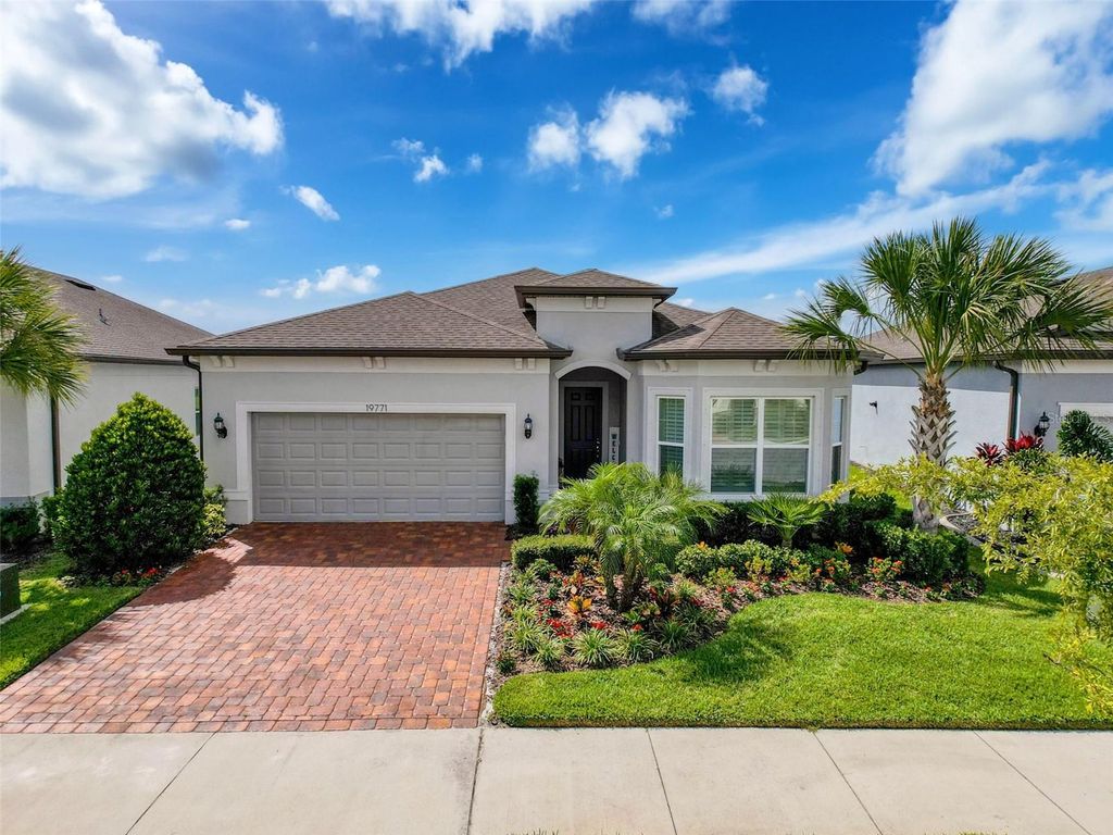 Photo of 19771 Ship Wheel Way, Land O Lakes, FL 34638 (MLS # W7879667)