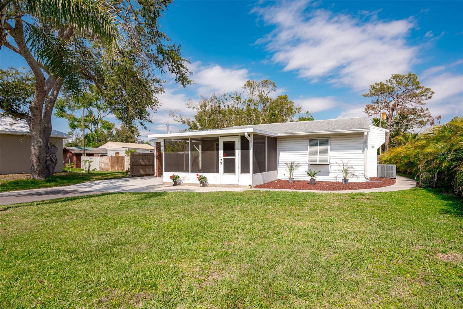 SELLER IS MOTIVATED! Welcome to this cute 2-bedroom, 1-bathroom home located in a quiet South Venice neighborhood! This charming residence boasts a cozy living area upon entry and completely updated bathroom. Granite countertops enhance the kitchen as well as lighted shelving and under cabinet lighting. Large Florida room can be utilized for dining or entertainment. Step outside to your private backyard oasis, where you'll find a fenced in yard and a refreshing pool and plenty of room on the oversized lot to enjoy outdoor activities, gardening, or RV/Boat Parking. Roof replaced in 2019, new carport 2023, new fence, 2022, new water treatment system 2023. Brand new septic system installed June 2025.
Minutes from shopping, beaches, schools, golf and more! Whether you're looking for a seasonal getaway or a full-time residence, this property is a great investment! Don’t miss out on the opportunity to make this your new home!