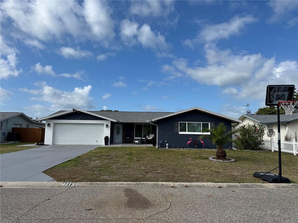 Photo of 10335 Loquat Drive, Port Richey, FL 34668 (MLS # W7882141)