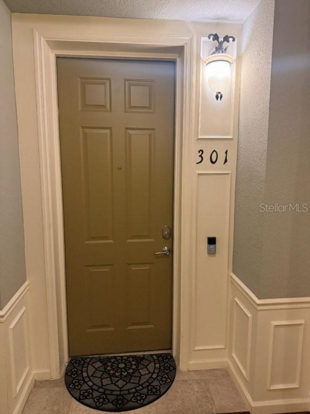 Photo of 3368 Robert Trent Jones Drive #301, Orlando, FL 32835 (MLS # O6413960)