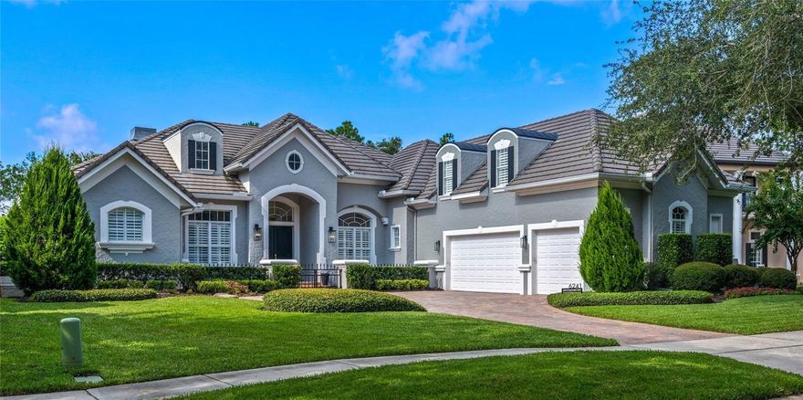 Experience luxury living in this stunning golf front home located in Windermere's prestigious Keene's Pointe, one of Central Florida's premier 24-hour guard-gated communities. Situated on a cul-de-sac, at first glance, you'll be impressed by the curb appeal of this home. As you step inside, you'll be welcomed by an expansive open floor plan combined with modern touches. The spacious living room is a true focal point; with large sliding glass doors, your eyes are immediately drawn to the pool and golf course views. The spacious living room seamlessly flows into a double island chef's kitchen, complete with a natural gas Viking stove, other high-end Viking and KitchenAid appliances, quartz countertops, and elegant gold fixtures. The cozy breakfast nook with large arched windows is the perfect spot to start your day, while the dining room offers ample space for hosting guests. The oversized primary suite on the main floor features pool views, a spa-like bathroom with a remodeled shower, and custom double closets. Additionally, the home offers a second primary suite on the main level, ideal for multigenerational living or accommodating extended family. Other highlights of the main floor include an additional guest suite and a versatile office that features a custom bookcase and can serve as an extra bedroom. Leading to your 3-car garage, you'll also find a spacious laundry room and a new built-in large fridge, freezer, and wine cooler combination. Upstairs, you'll find a spacious bonus room, craft room, and full bathroom. This space can be used as a true 5th bedroom suite and many other functions. Many upgrades have been done to this home, so please request the full list. Step outside to experience the calm and beauty of Central Florida. The screened-in lanai offers a large, heated saltwater pool and spa, where you can relax while enjoying views of the 7th hole at the renowned Golden Bear Club, a Jack Nicklaus Signature Golf Course. With a direct view of the entire par-3 hole from your backyard, you'll be immersed in the vibrant golf course lifestyle. Keene's Pointe is more than just a place to live; it's a community offering a variety of amenities, including two boardwalks leading to Lake Tibet, part of the famous Butler Chain of Lakes. The community also features two boat launches, four playgrounds, and a variety of events. It is also home to The Golden Bear Club—a private country club, for an extra fee, offering a clubhouse, an 18-hole championship golf course, tennis courts, a gym, a pool, and numerous social events for its members and guests. This home is also conveniently situated close to Orlando's world-renowned attractions, shopping, dining, and major highways. It's clear to see why a house like this offers a premier lifestyle here in Central Florida. Don’t miss your opportunity to own a slice of paradise in this sought-after community. Schedule your private showing today and experience the luxurious lifestyle that Keene’s Pointe has to offer.