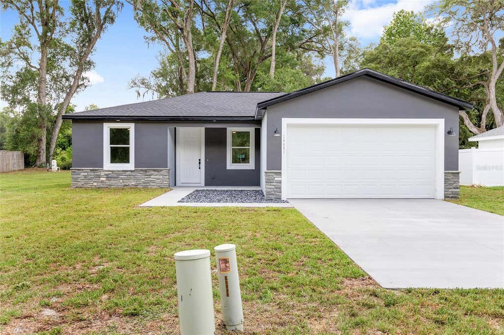 Photo of 14481 SE 38th Terrace, Summerfield, FL 34491 (MLS # OM726678)
