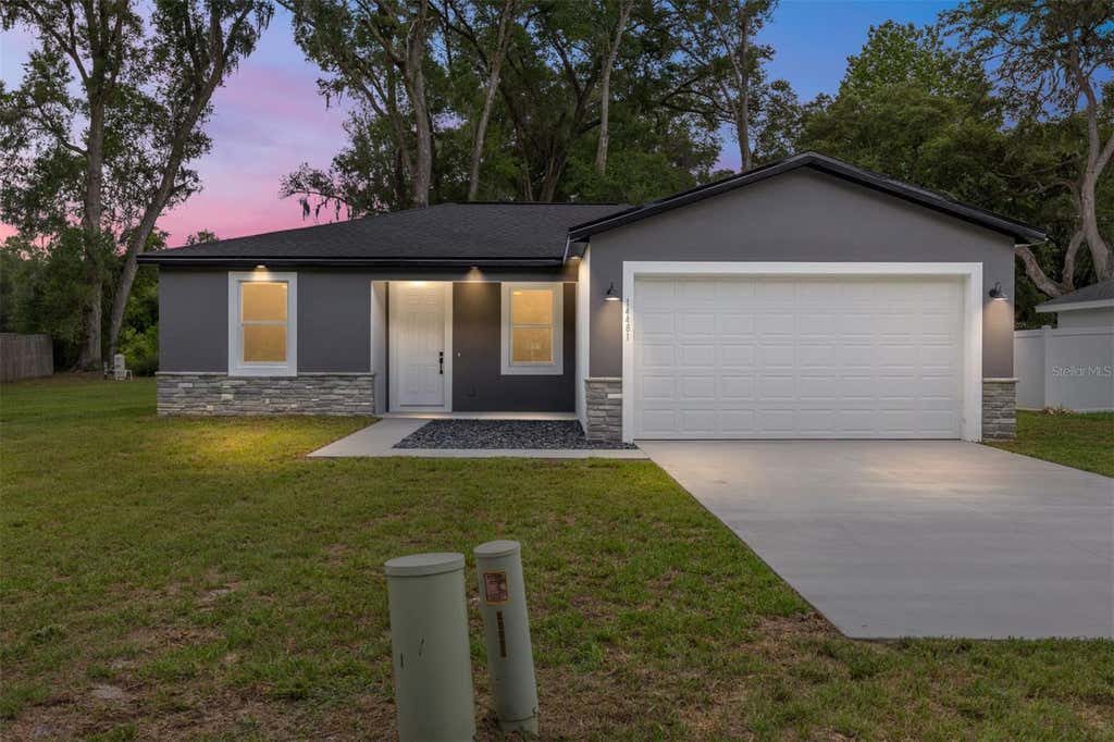 Photo of 14481 SE 38th Terrace, Summerfield, FL 34491 (MLS # OM726678)