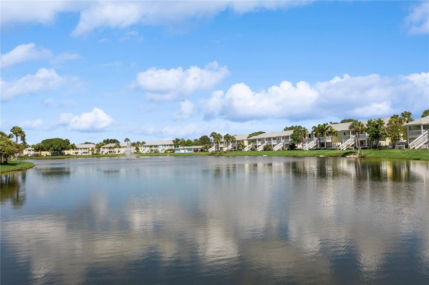 Come fall in love with this Waterfront FULLY RENOVATED GROUND FLOOR unit. This GROUND FLOOR unit comes FURNISHED and ready to occupy or rent out for the busy snowbird season around the corner. The building was recently painted on the exterior, and the interior has been beautifully renovated. The kitchen features designer color BLUE cabinets with GOLD ACCENTS and a SHIPLAP BACKSPLASH. This is paired with a rick honey colored 1.5” THICK ACACIA WOOD BUTCHER BLOCK countertop and 10" deep kitchen sink made of premium 16 gauge thick T-304(18/10) stainless steel. There’s also a NEW STAINLESS STEEL REFRIGERATOR, a DOUBLE OVEN, and a NEW MICROWAVE. Additionally, LIGHTED UPPER CABINETS make the space feel airy and bright. The kitchen outlet at the newly designed island has been updated with a USB adaptive plug, so you can plug in your phone or other USB devices conveniently. The unit features new water resistant LUXURY VINYL PLANK flooring throughout, along with ELEGANT 5 ¼” BASEBOARDS everywhere. The walls have been painted Olympus White and a SHIPLAP FIREPLACE has been CUSTOM DESIGNED for the space. The fireplace build out is flanked by wood shelving, the bottom of which is set to desk height to allow for addition of chairs and use as a laptop workstation. The bathroom has NEW TILE, FIXTURES, MIRROR, VANITY, TOILET, AND LIGHTING; along with a decorative shiplap and boat cleat accent that allows hanging of 6 towels so that all your guests will have a spot of their own. The fan in the bathroom also features a BUILT IN BLUETOOTH SPEAKER, so just connect with your phone and you’ll be singing in the shower to your favorite music. The master bedroom has a SHIPLAP ACCENT WALL and the second bedroom, with it’s beach cabana theme, has been designed to allow for two full beds so that you can sleep 4 comfortably in the second bedroom. Outside, you’ll love the OVERSIZED PATIO. Seriously, it’s huge, the photos don’t do it justice. And, the best part is the location on the water. Located at the end of the length of the pond allows for the LONGEST WATER VIEWS possible. You’ll love the vast views of water and wildlife from your patio, and from the large window in the kitchen and the 3 glass doors in the living room. The view is unforgettable, especially when you SEE IT AT SUNSET. Also, the unit has it’s own stackable WASHER AND DRYER, no need to head to the laundry room! Sold FULLY FURNISHED AND EQUIPPED. Now on to the community amenities… The condo fee includes Spectrum TV & internet, common area maintenance, insurance, water, trash, sewer and secure gated entry. Enjoy tennis, pickleball, swimming in the heated pool, lush landscaped grounds which offer acres to walk your dog around the pet-friendly community, dog park, and fitness center. Additionally, while this unit pays lower fees than sister community Waterside South, it does come with the use of all Waterside South amenities (clubhouse, hot tub, pools (heated in Winter), spas, fitness center, volleyball, shuffleboard, golf practice area, dog park, pub, etc) at nearby Waterside at Coquina Key South only 5 minutes away You are allowed short term rentals 3x/year less than 30 days; and no limit on rentals over 30 days.