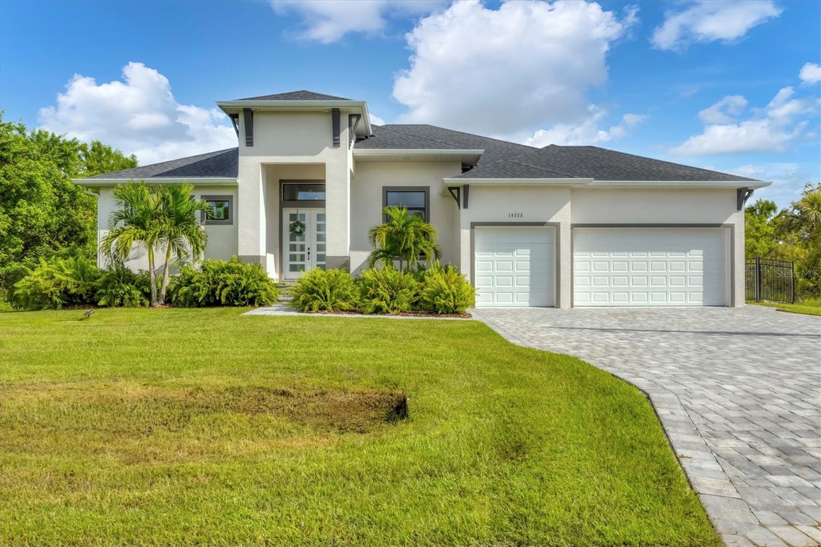 Pre-Construction. To be built. Enjoy the freedom of building where you want with the upgrades you want! Luxury abounds in this 3/2 plus Den and 3 car garage. Our fabulous Boca Bay model comes loaded with soaring ceilings and gorgeous upgrades. You can build this home on your lot or purchase ours for an additional fee. Home will take 12-18 months to complete once you close on the lot and sign with the builder. Pictures shown are of the model home located at 14322 Cando Ave in Port Charlotte, which features some upgrades not included in the base price of the home. The Boca Bay model offers 12’ 8” ceilings throughout with 2’ tray ceiling in the living room and a spacious split open floor plan that gives the home a grand and airy feel. Other high end upgrades include 10' tall 90 degree pocket sliders in the living room, 14’ wide master shower, white washed plank floor tile throughout, walk-in shower in the pool bath, stone floor tile, and tile to the ceiling in the bathrooms. The stunning kitchen features 42” upper cabinets, a copper farmhouse sink, and a gorgeous oversized island. Pool packages start at $79,000. The Boca Bay model home is available for showings. Please use ShowingTime or call for an appointment. Other model floor plans are available upon request.