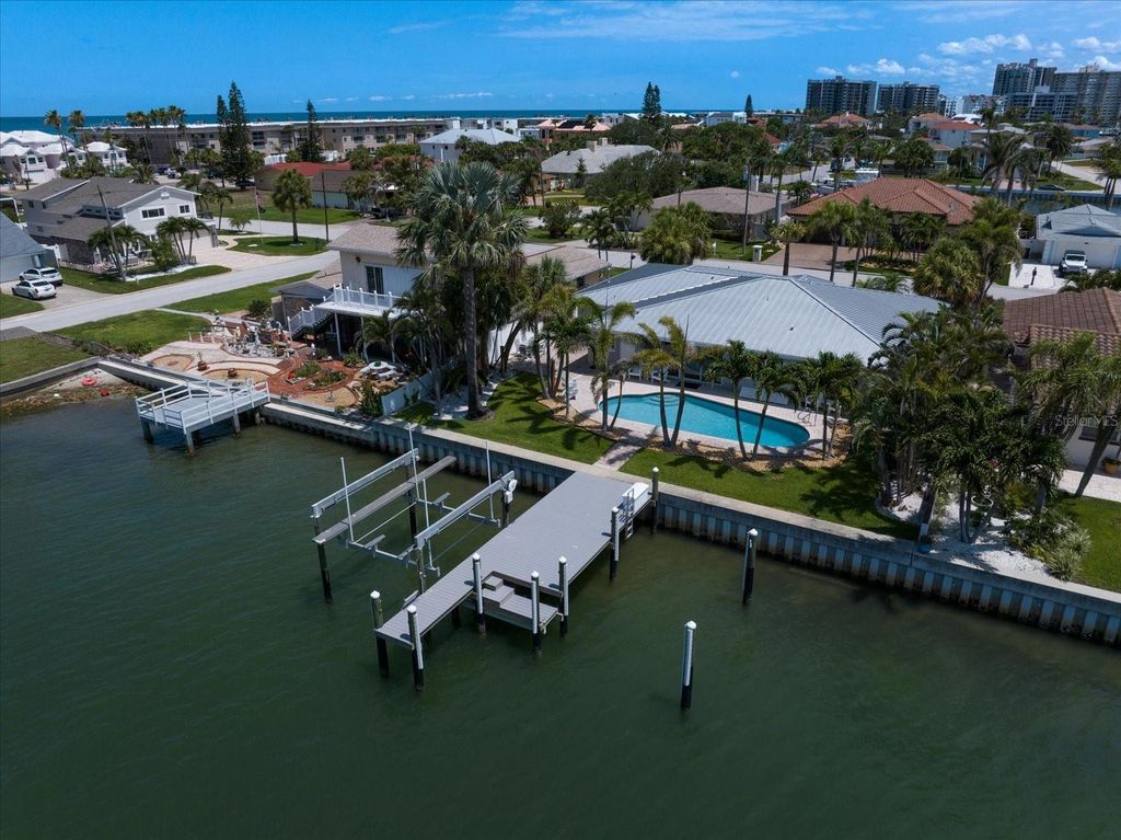 Photo of 202 Howard Drive, Belleair Beach, FL 33786 (MLS # TB8396348)