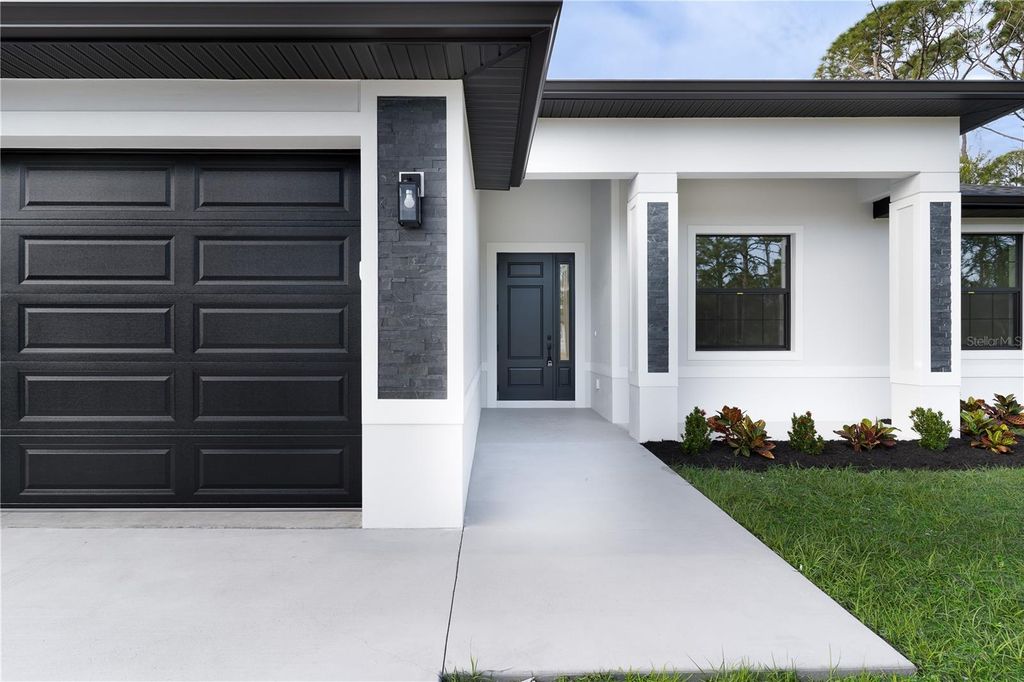 Photo of 13197 Gotham Avenue, Port Charlotte, FL 33953 (MLS # A4691220)