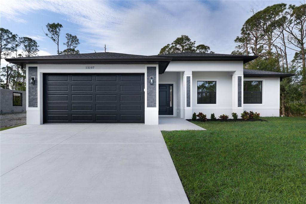 Photo of 13197 Gotham Avenue, Port Charlotte, FL 33953 (MLS # A4691220)