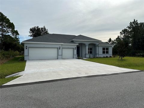 Photo of 35 Ulmaceal Path, Palm Coast, FL 32164 (MLS # FC311420)