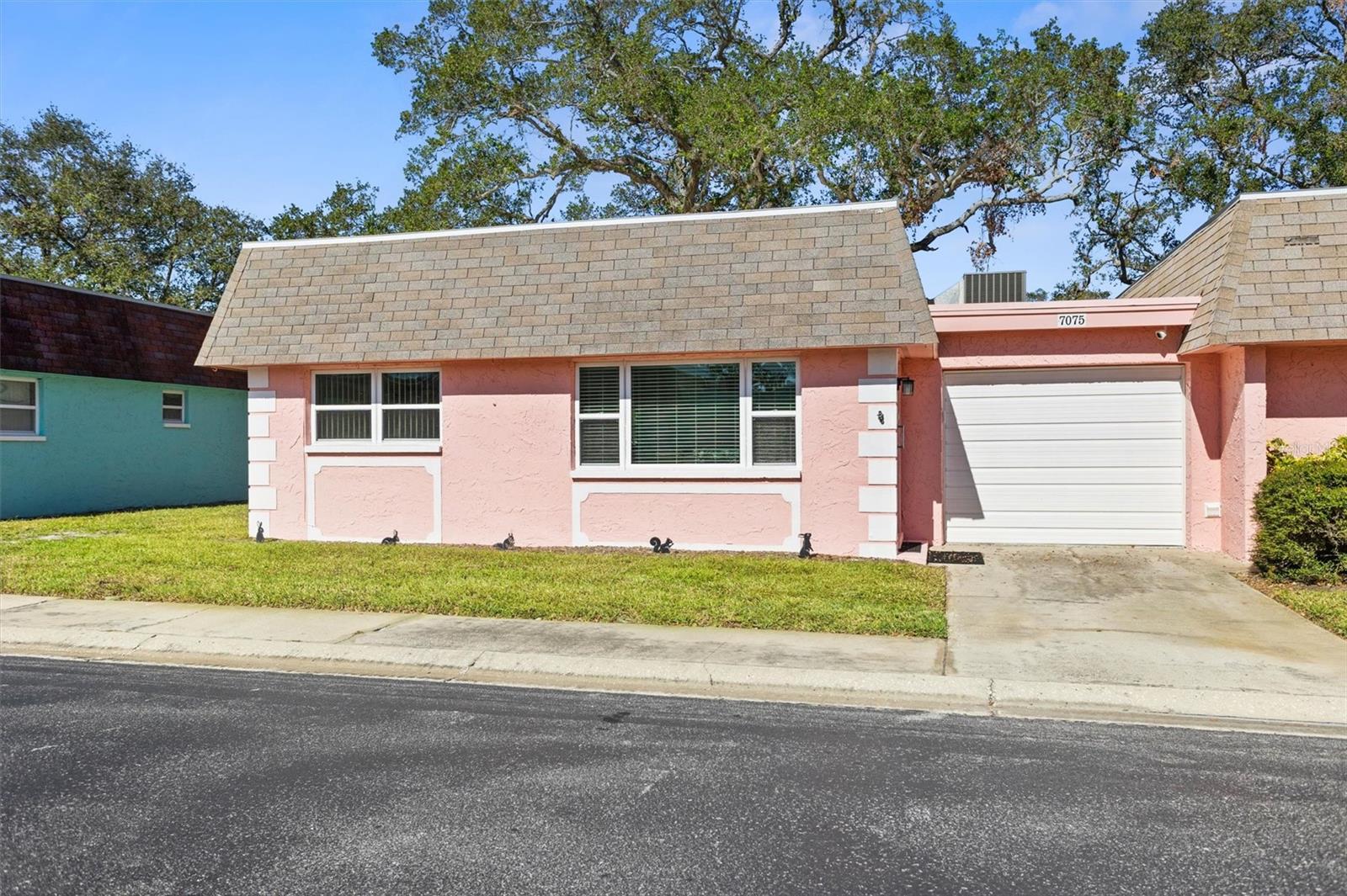 JUST LISTED! Great price for this lovely Villa! Where can you find a move in ready Waterfront villa for under $140k? Don't miss out on this peaceful retreat in a well-maintained 55+ community? This charming 2-bedroom, 2-bathroom villa with a 1-car garage in Vendome Village, Pinellas Park, might be just what you’re looking for! This end-unit villa boasts a bright, airy layout with plenty of space to relax and entertain. Step outside to the back patio, where you can sit by the canal and enjoy the peace and serenity while watching water birds of all kinds, fish, turtles, otters, even the occasional manatee. The updated Luxury Vinyl Plank flooring adds a modern touch, while the large living room and flexible kitchen-adjacent space can be tailored to your needs—whether it’s an extra guest area, office, or dining nook. This home comes with a range of recent updates, including, a New Roof in 2024 (covered by HOA). Electric panel updated in 2022. New garage door opener and freshly refinished garage floor. All-new interior doors, new toilets, and a 2-year-old refrigerator. Washer and dryer less than 3 years old are in the garage!! No going to a common laundry room! Move in ready! The main bedroom features an ensuite bathroom and a walk-in closet, making it a comfortable retreat within the home. Vendome Village offers everything you need for a low-maintenance lifestyle, including a community pool, shuffleboard courts, grills and clubhouse. The beautifully landscaped complex is conveniently located near shopping, restaurants, and more. And for peace of mind, this property did not flood during recent storms. Living in this 55+ community means enjoying a tranquil environment with great amenities and a close-knit neighborhood feel. Single story condo that does not require state mandated inspections and remediation. Whether you’re looking for a seasonal home or a full-time residence, this villa is a fantastic option. Don’t Miss Out! Schedule a tour today to see this wonderful villa for yourself. With its excellent layout, outdoor space, recent updates, and ideal location.