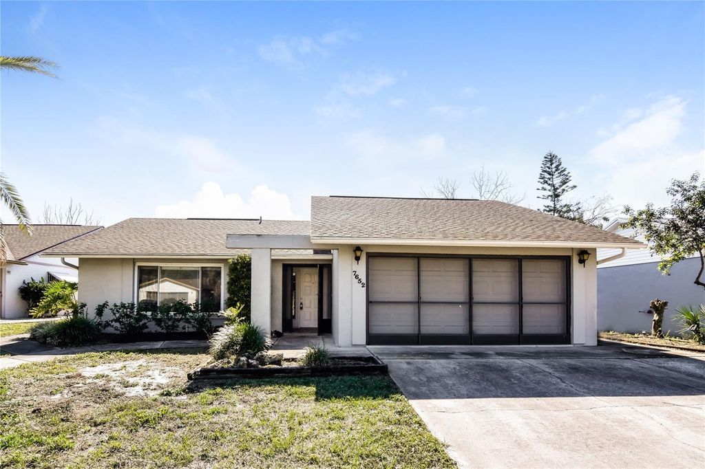 Photo of 7652 Atherton Avenue, New Port Richey, FL 34655 (MLS # O6364559)