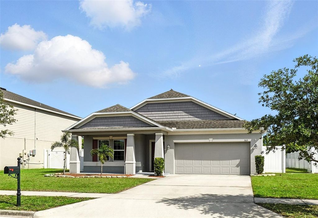 Photo of 303 Briarbrook Lane, Haines City, FL 33844 (MLS # TB8400561)