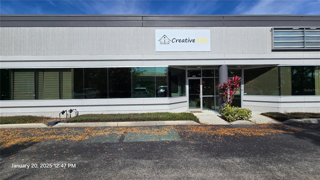 Photo of 7901 Kingspointe Parkway #23, Orlando, FL 32819 (MLS # O6424229)