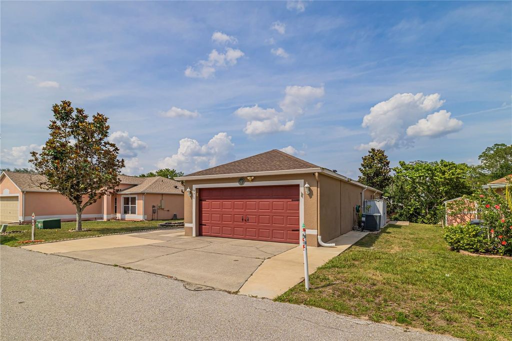 Photo of 50989 Highway 27 Dr #371, Davenport, FL 33897 (MLS # O6302143)