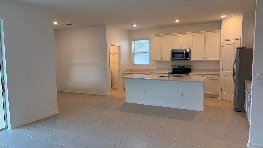 Photo of 2989 Good Vibes Way, Clermont, FL 34714 (MLS # O6373660)