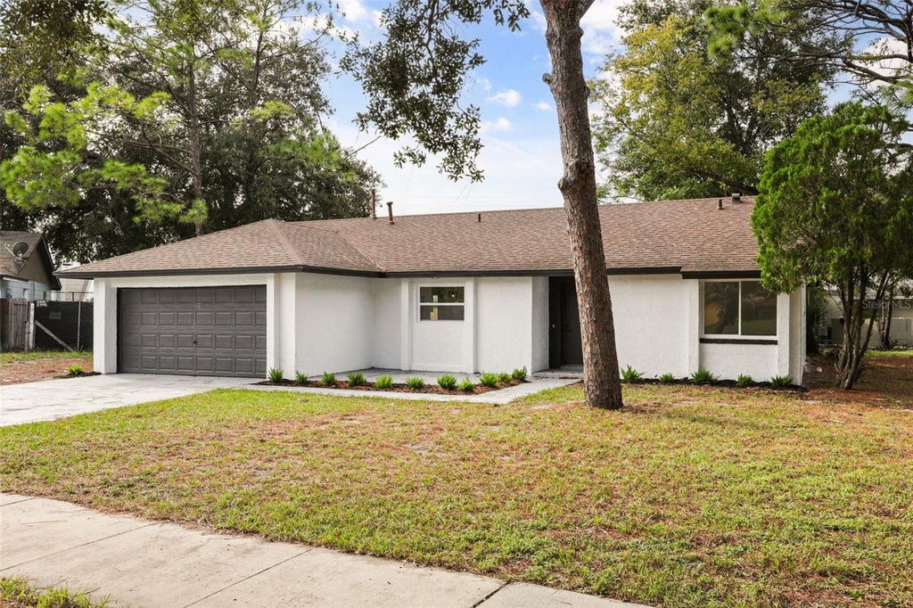 Photo of 4840 Red Willow Avenue, Orlando, FL 32808 (MLS # O6446400)